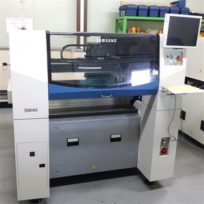 A máquina usada original Samsung SM411 do mounter da microplaqueta de SMT escolhe e coloca a máquina